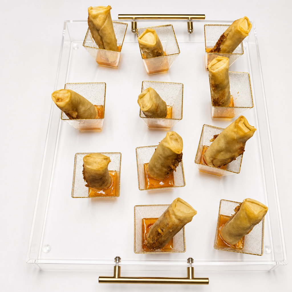 Spring roll bites on acrylic tray