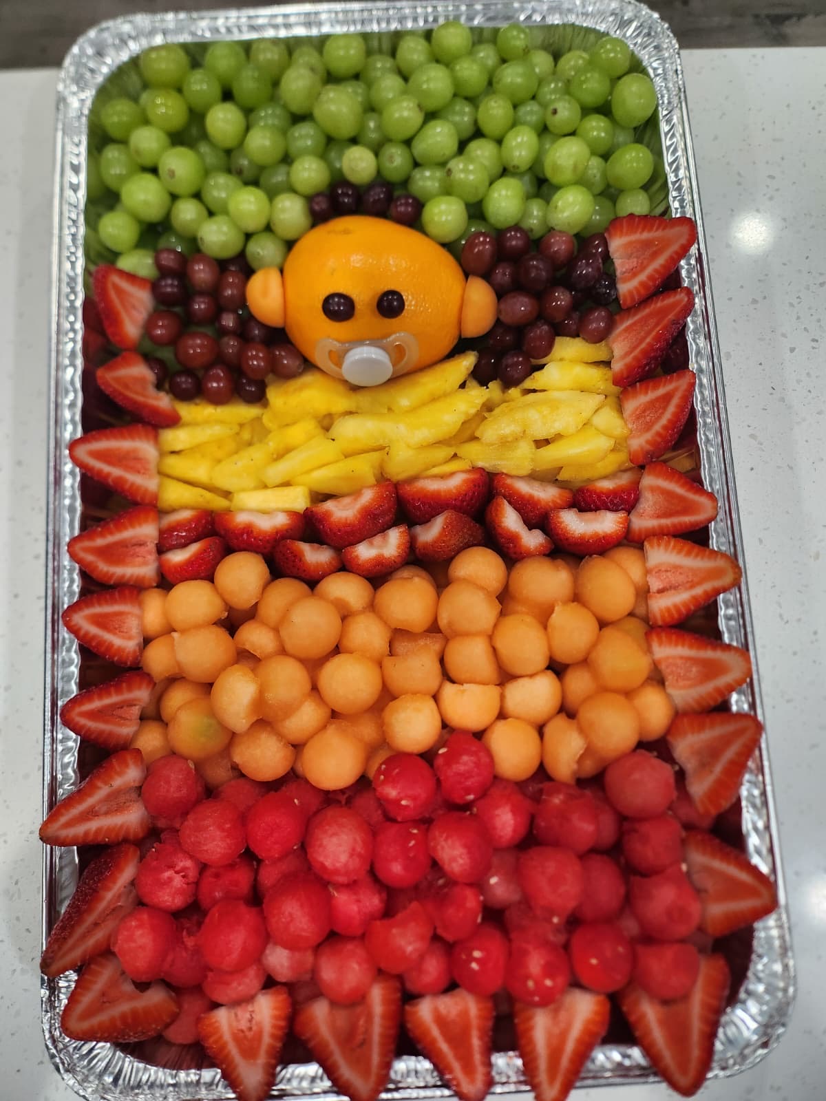 Baby shower fruit tray with creative design